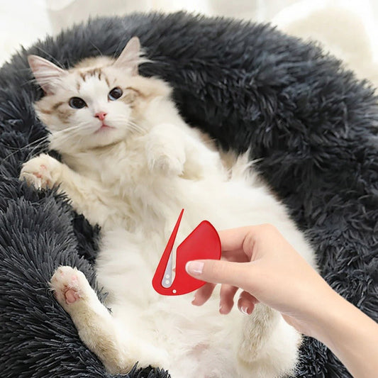 Le Coupe Noeuds - PetKnotClippers™  permet de démêler facilement les nœuds dans le pelage de nos amis.