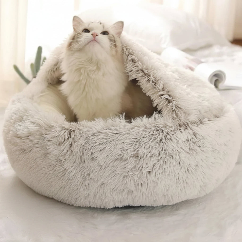 Niche pour chat ultra moelleux un caht sort la tete